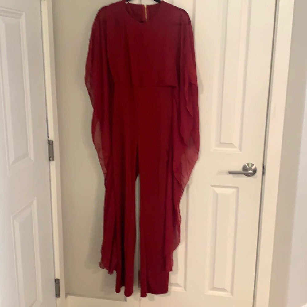 Red sleeves romper with sheer arm down to bottom
